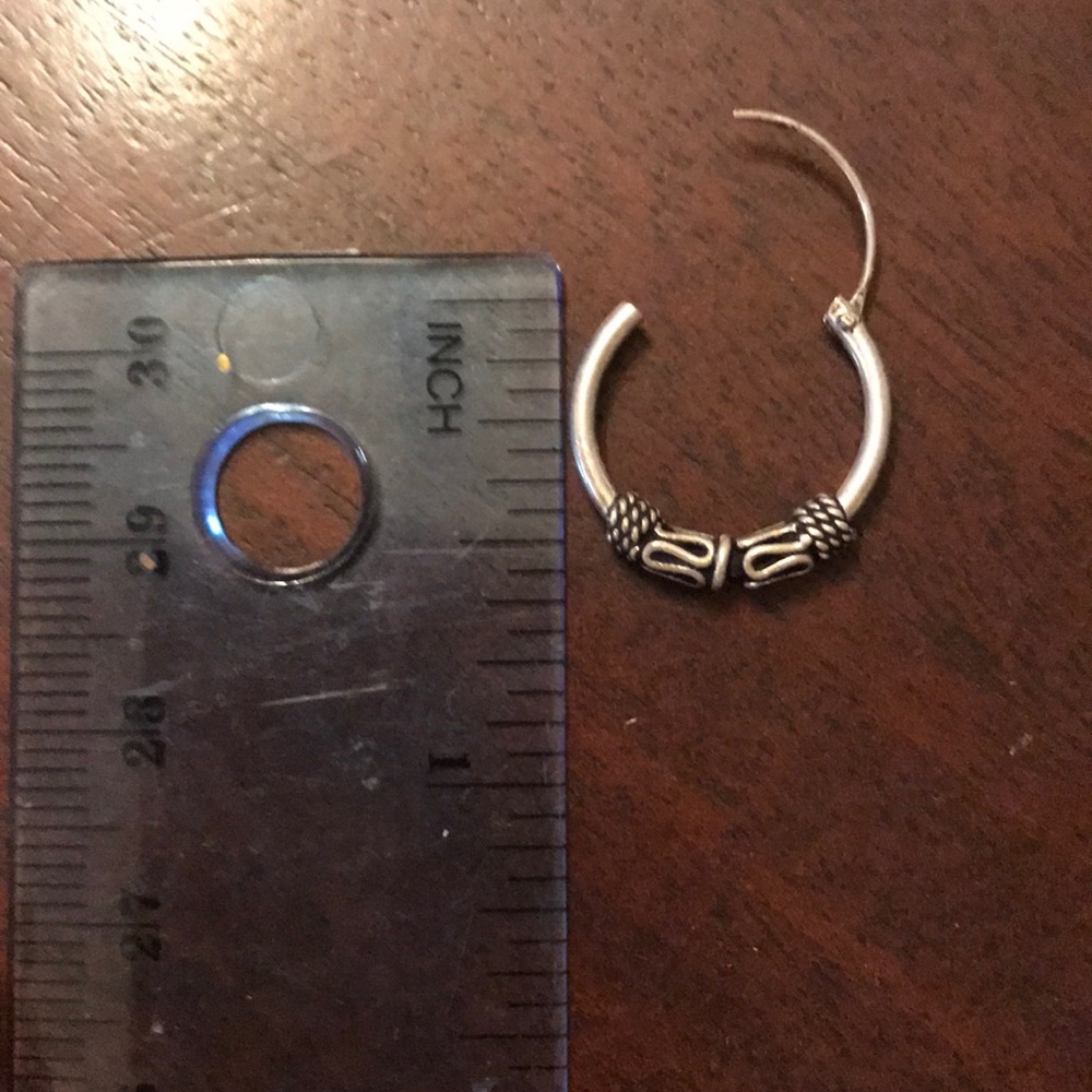 One single sterling silver hoop